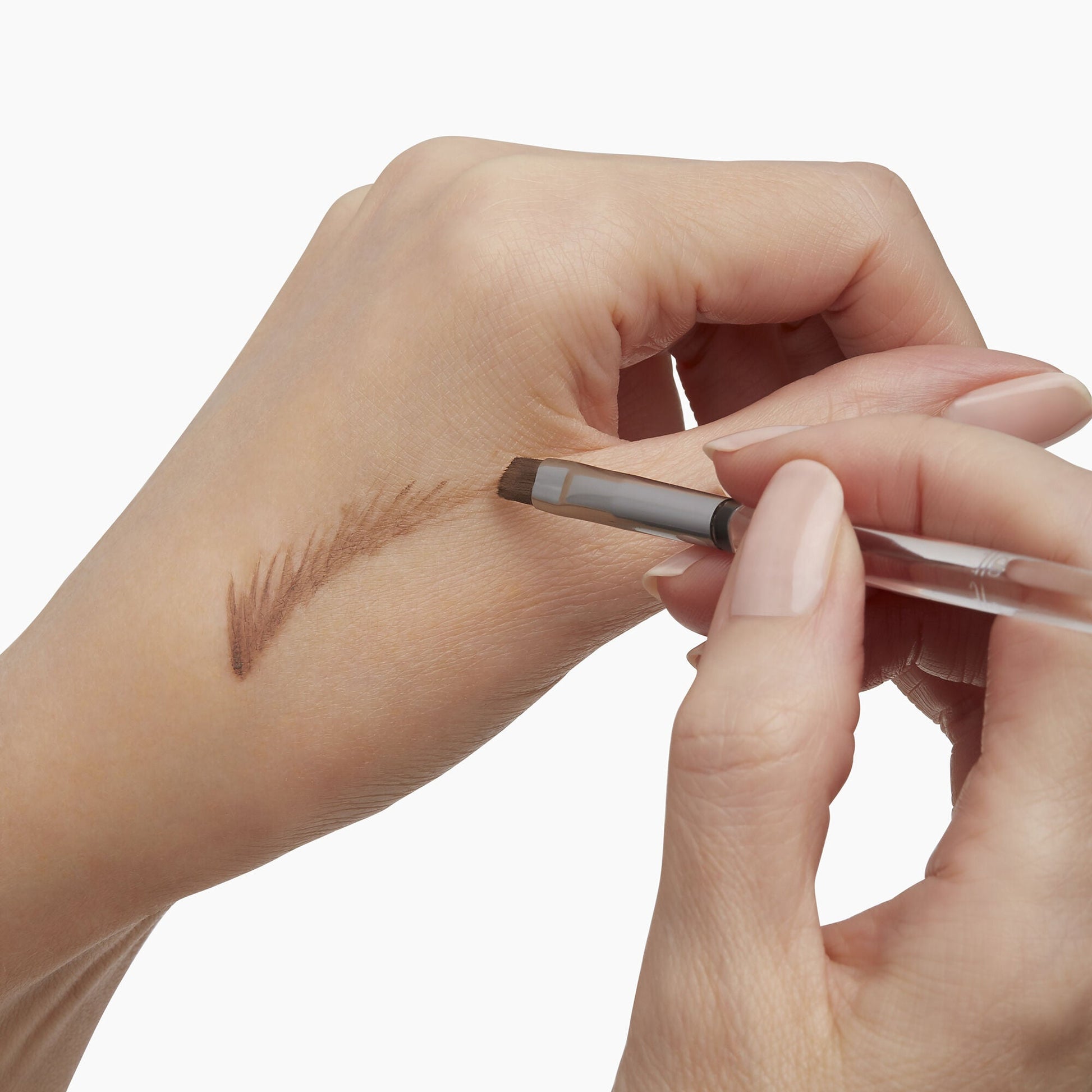 precision-dual-sided-eyebrow-brush-s0 85315_PrecisionDualSidedEyebrowBrush_Model_V2.jpg